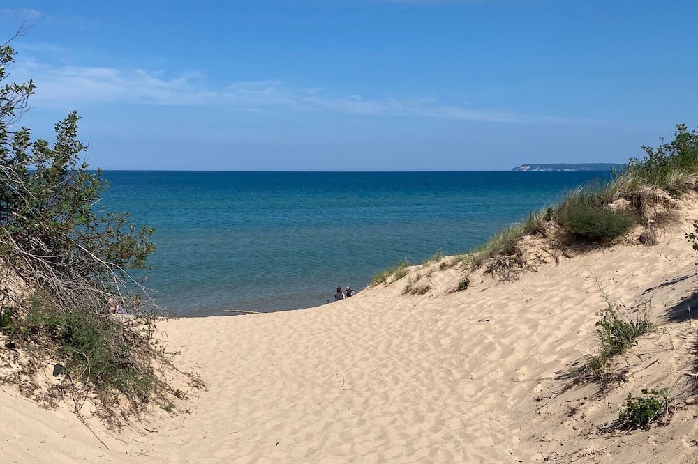 Pentwater Cottage | Cozy 3-bedroom cottage, large yard, minutes from Lake Michigan. Pet friendly.