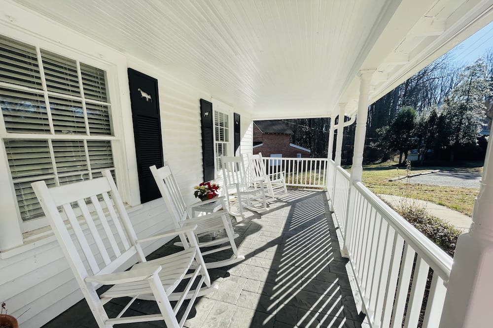 Clemmons House | Escape to serenity at our distinctive retreat, nestled behind the Excelsior at the Manor House