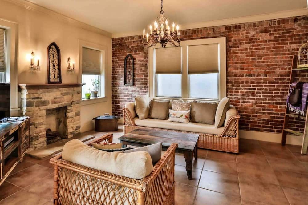 Maple Ridge Apartment | The Teak Follow, beautiful brick enclosed space