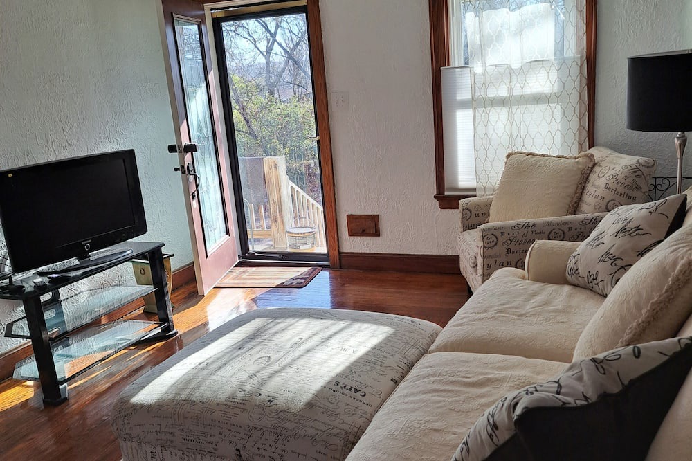 Spring Grove Village House | Charming woodside cabin feel.
