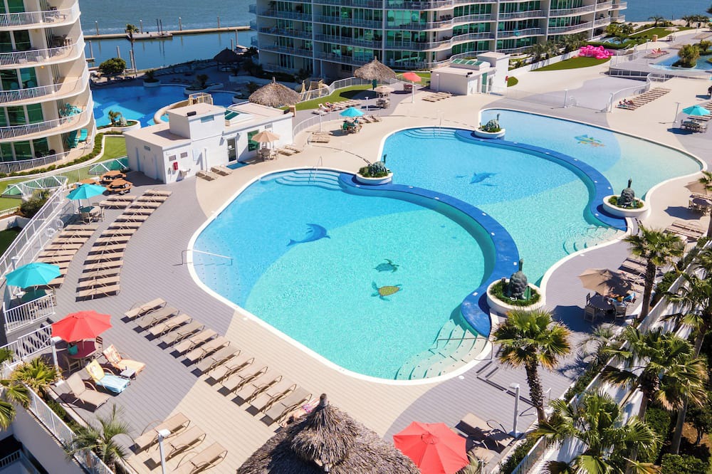 Orange Beach East Condo | Luxurious Bayside Four Bedroom Condo with Panoramic Views. Complimentary Boat Slip!