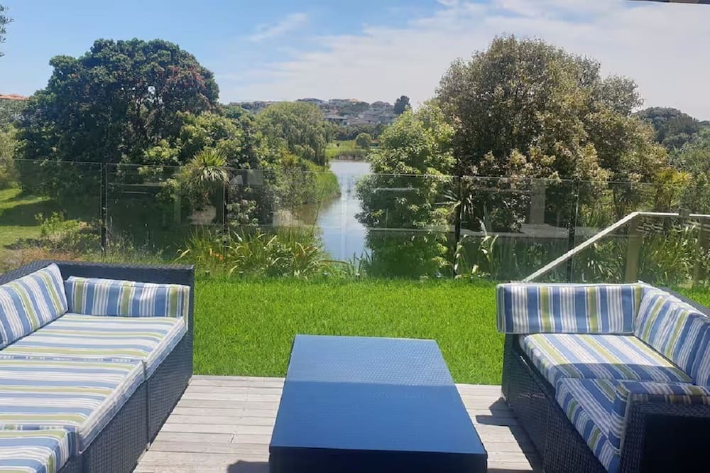 Gulf Harbour House | Down the steps. Two Bedrooms Lake views.