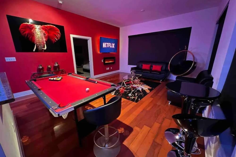 Loring Heights Apartment | The Red Room - Cloud Ceilings - Patio & Bathroom TV