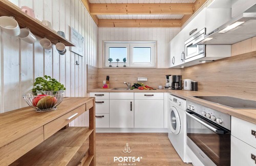 Olpenitz House | Nordstern - infrared sauna, bathtub, fireplace, shower, terrace, beach chair