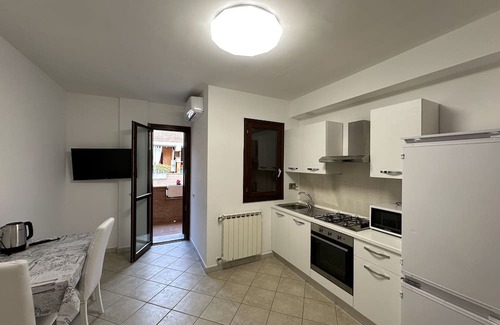 Zona XXX Castel Fusano Apartment | Vrbo Property