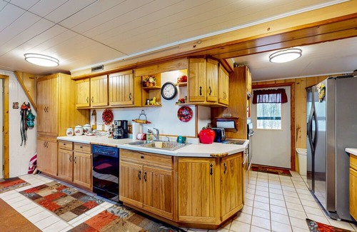 Hazelhurst House | Lakefront dog-friendly home with kayaks, rowboat, dock, private lake, & firepit