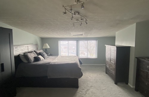 CUF Condo | Two-Story Luxurious Condo with Deck and Amazing City Views Close to the Action