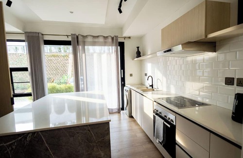 Kigali Apartment | Modern & Cozy Two-Floor Getaway: Central Location!