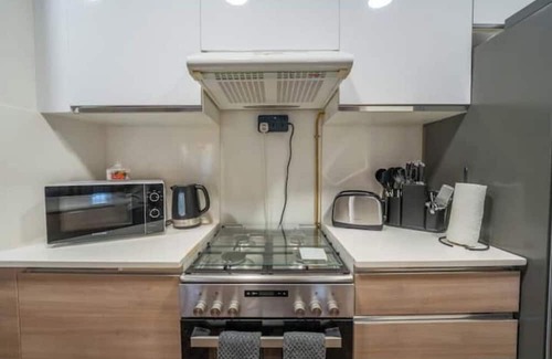 Dubai Production City Condo | 1BHK Luxury Serviced Apartment - Al Andalus JGE