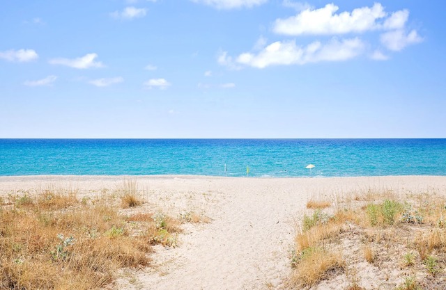 Enjoy a magnificent view of the sea from this vacation apartment.