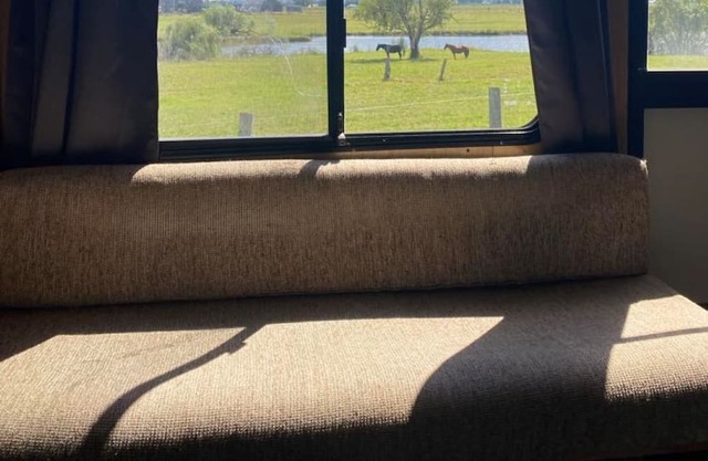 Cosy van in private setting with stunning views of the Hunter River.
