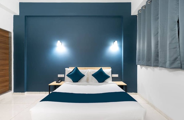 Capital O New Paradise Inn