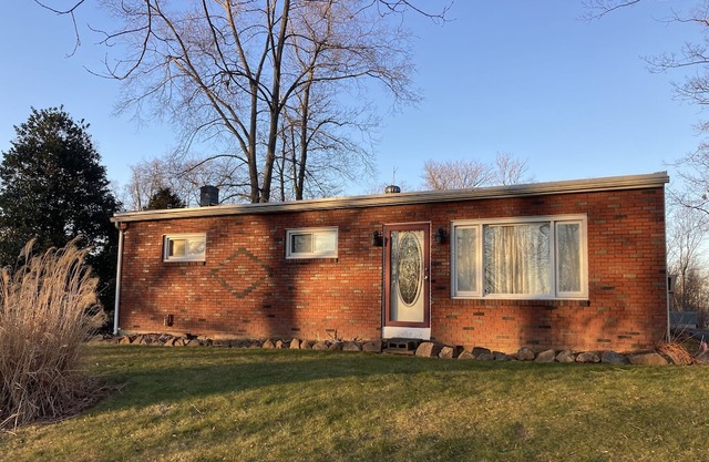 Three bedroom rancher in a quiet country setting off street parking
