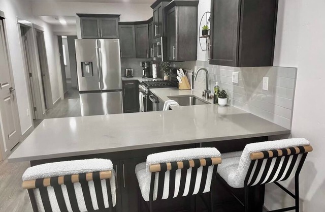 North End/Stay in Boise’s coveted North End! This 3BR/2BA retreat blends modern style with Boise charm. Minutes from downtown, Hyde Park, Camel’s Back Park, 13th Street and the Greenbelt. Relax in the backyard oasis.