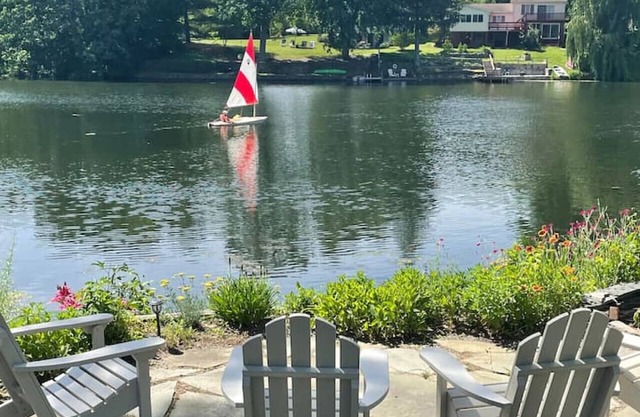 Lake Front Cottage with Sun Soaked Terraces